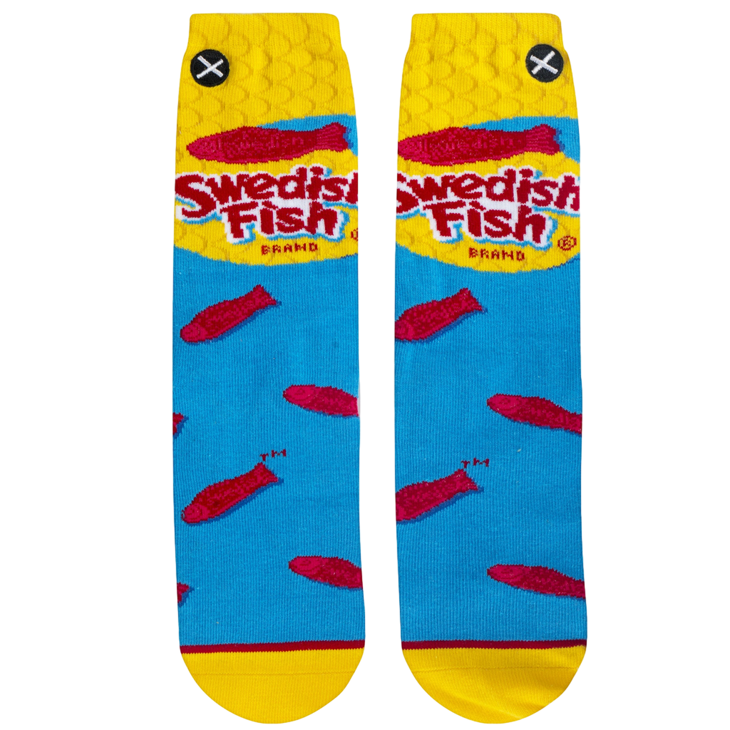 Flat lay product shot of a pair of Swedish Fish socks, showcasing the full design.