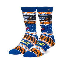 blue socks with snowflakes, christmas trees, and tony the tiger wearing a santa hat holding a bowl of frosted flakes. ribbed cuff, reinforced heel and toe. crew length. for men and women.  
