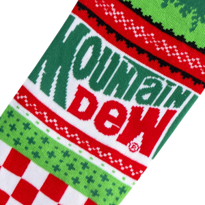 A pair of red and green socks with a pattern of snowflakes and the words 