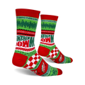 Lifestyle shot of a pair of Mountain Dew Ugly Sweater socks, showing how they look when worn.