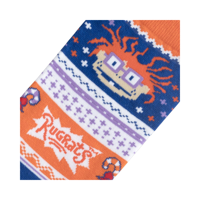 Close-up detail shot of the Chuckie Ugly Sweater socks, highlighting the Rugrats logo and Chuckie's face.