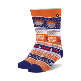 orange crew socks with snowflakes, candy canes, and rugrats characters wearing santa hats.   