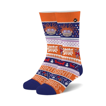 orange crew socks with snowflakes, candy canes, and rugrats characters wearing santa hats.   