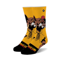 Pair of crew socks; predominantly yellow with black accents.  Features Dhalsim from Street Fighter 2 in a dynamic pose.