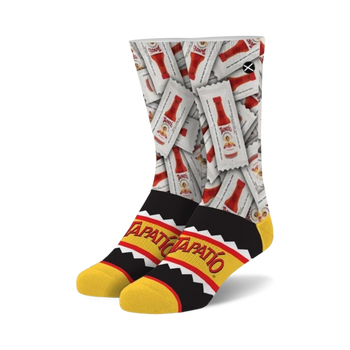 white crew socks with black toe and heel and a tapatio packet pattern, for men and women.  