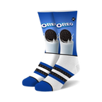 Pair of crew socks in blue, white, and black featuring an Oreo cookie dunked in milk graphic. 