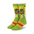 Crew socks in lime green with Sour Patch Kids candy designs and orange, yellow, and red stripes at the cuffs. 