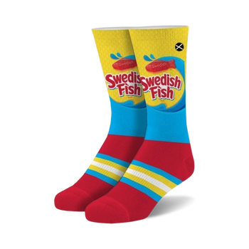 yellow socks with red bottom and blue band with three white stripes. text says "swedish" in red on yellow and "fish" in blue on red. red swedish fish candy graphic. crew length. for men and women.  
