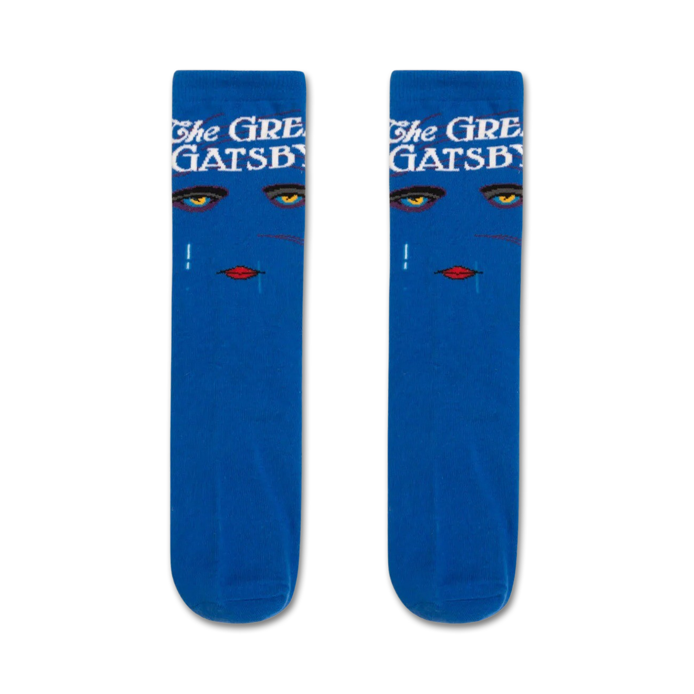 Pair of blue crew socks with an Art Deco design. The socks feature a woman's face with gold eyes and red lips, along with the text 'The Great Gatsby'.