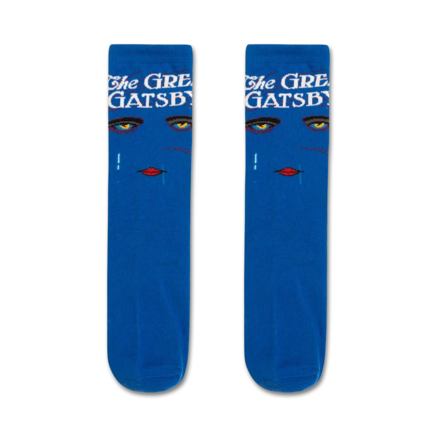 Pair of blue crew socks with an Art Deco design. The socks feature a woman's face with gold eyes and red lips, along with the text 'The Great Gatsby'.