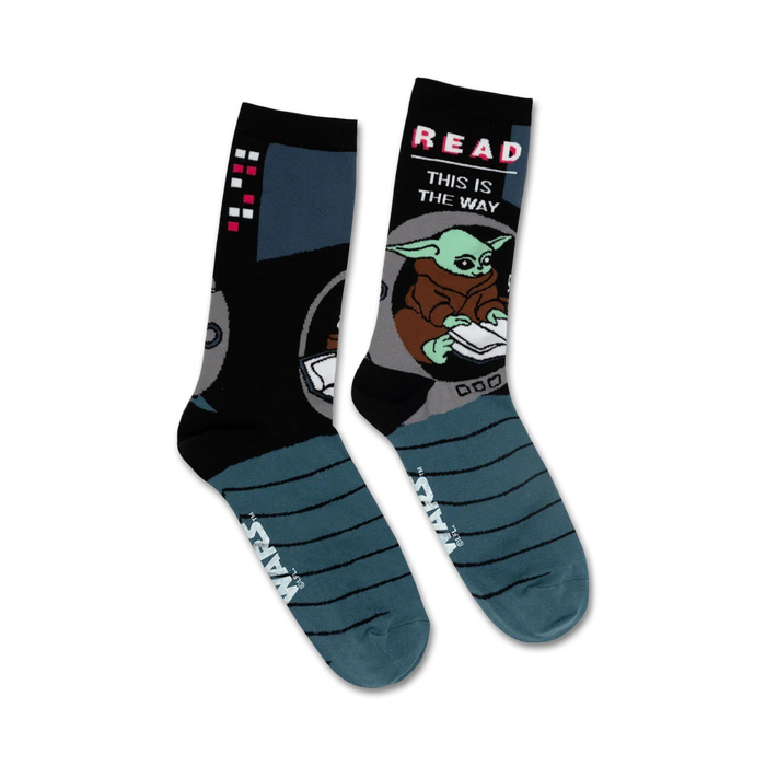 black star wars grogu read socks with blue cuff features grogu reading. text on socks - 