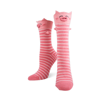 Pair of pink and white striped knee-high socks with 3D pig faces, ears, and snouts on the cuffs.
