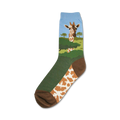 Crew socks showcasing a giraffe's face peeking from green savanna.  The socks are primarily green, brown, and light blue with a giraffe pattern.
