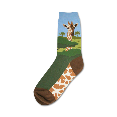 blue and brown crew socks showcasing a giraffe standing in a green field.  