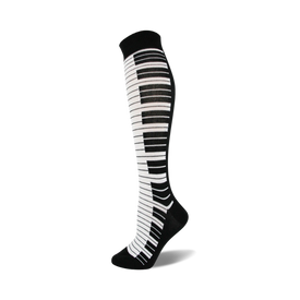 black and white knee high women's socks with a piano key pattern.   