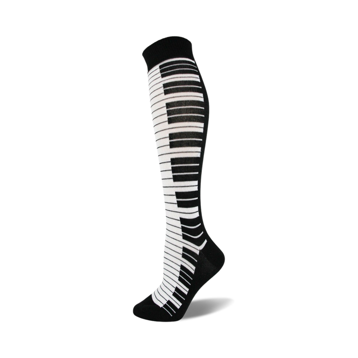 black and white knee high women's socks with a piano key pattern.    }}