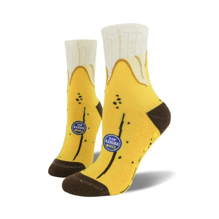 yellow crew socks with brown toe and heel. non-skid soles. banana pattern in black and brown.   }}