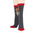 Flatlay showcasing a pair of 'Realtor' socks, highlighting the design detail.