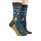 Pair of 'Let's Have S'more Fun!' socks on a model's feet against a black background.