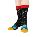 A front-facing view of a pair of Sputnik socks on a model, highlighting the full design.