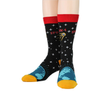 A front-facing view of a pair of Sputnik socks on a model, highlighting the full design.