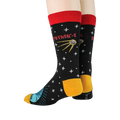 Rear view of Sputnik socks on a model's legs, emphasizing the sock's design elements.