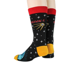Rear view of Sputnik socks on a model's legs, emphasizing the sock's design elements.