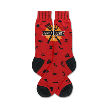 red crew socks with black toe, heel, and cuff. yellow banner with "grill boss" in black text. pattern of grilling items including spatulas, tongs, hot dogs, hamburgers, steaks, and fish.  
