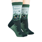 Lifestyle image showing Happy Camper socks on a person's feet.