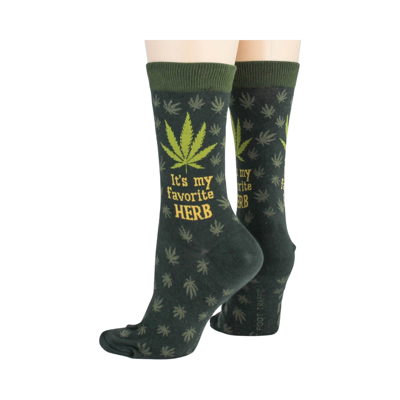 Close-up flatlay showcasing the detail of the marijuana leaf socks, highlighting the 'It's my favorite herb' text and '420' detail.