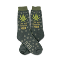 Crew socks in dark green with a repeating marijuana leaf pattern.  'It's my favorite herb' and '420' are featured on the socks.