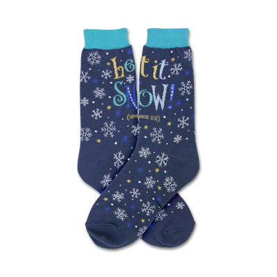 blue crew socks with white, gold, and light blue snowflake pattern. "let it snow...somewhere else" in cursive. christmas theme.   