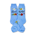Pair of light blue crew socks with small floral bouquets and the words 'blessed' and 'thankful' embroidered on them.