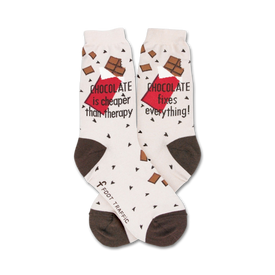 white crew socks with brown polka dots proclaim that 'chocolate is cheaper than therapy'.  