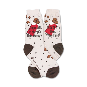 white crew socks with brown polka dots proclaim that 'chocolate is cheaper than therapy'.  