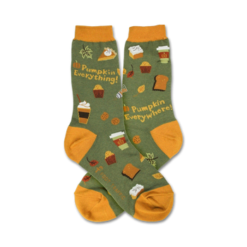 green crew socks with orange toe, heel, and cuff. featuring pumpkins, leaves, and the words "pumpkin everything...everywhere."  