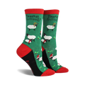 Pair of women's crew socks. Green background with festive sheep wearing Santa hats and scarves. Red and black accents.