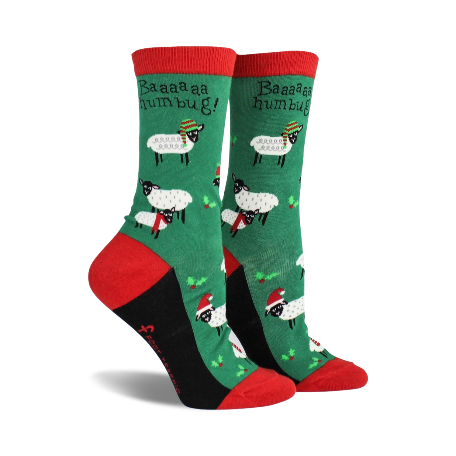 Pair of women's crew socks. Green background with festive sheep wearing Santa hats and scarves. Red and black accents.