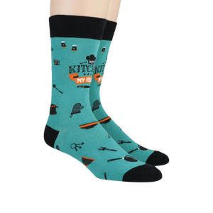 A pair of teal socks with the words 