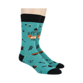 Lifestyle shot: Two people wearing teal 'My Kitchen My Rules' socks.