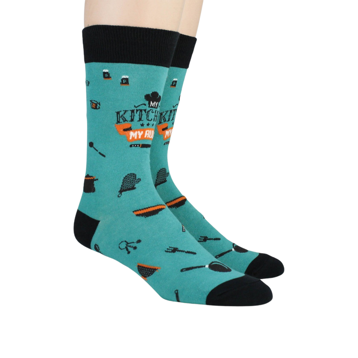 A pair of teal socks with the words 