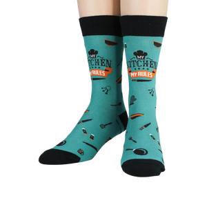 A pair of teal socks with the words 