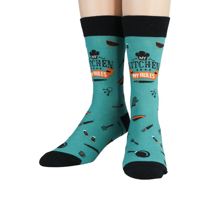 A pair of teal socks with the words 