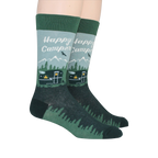 Lifestyle shot of two Happy Camper socks on a person's feet.