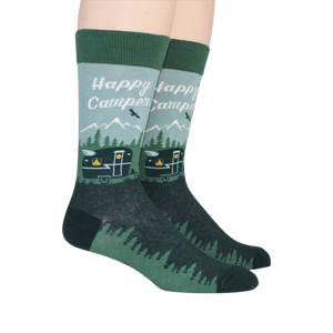 Lifestyle shot of two Happy Camper socks on a person's feet.