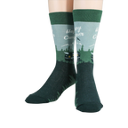 Flatlay image showing two Happy Camper socks laid flat.