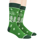Lifestyle shot of a person wearing a pair of green 'Accountant' socks.
