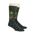 Lifestyle shot: A person's legs wearing the marijuana leaf socks, showcasing the fit and style.