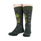 Close-up detail shot of the marijuana leaf and 'It's my favorite herb' text on the socks.