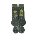 Pair of dark-green crew socks with a repeating cannabis leaf pattern, 'It's my favorite HERB' text, and '420' detail.